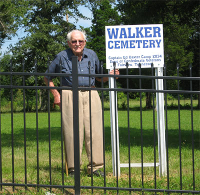 Camp 2034 member Mr. Carl Walker by the new Historic Walker Cemetery sign.