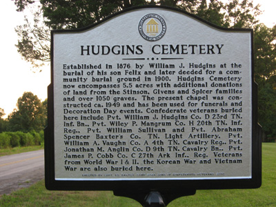 members of 2034 by the Rials-Sullivan Cemetery Sign